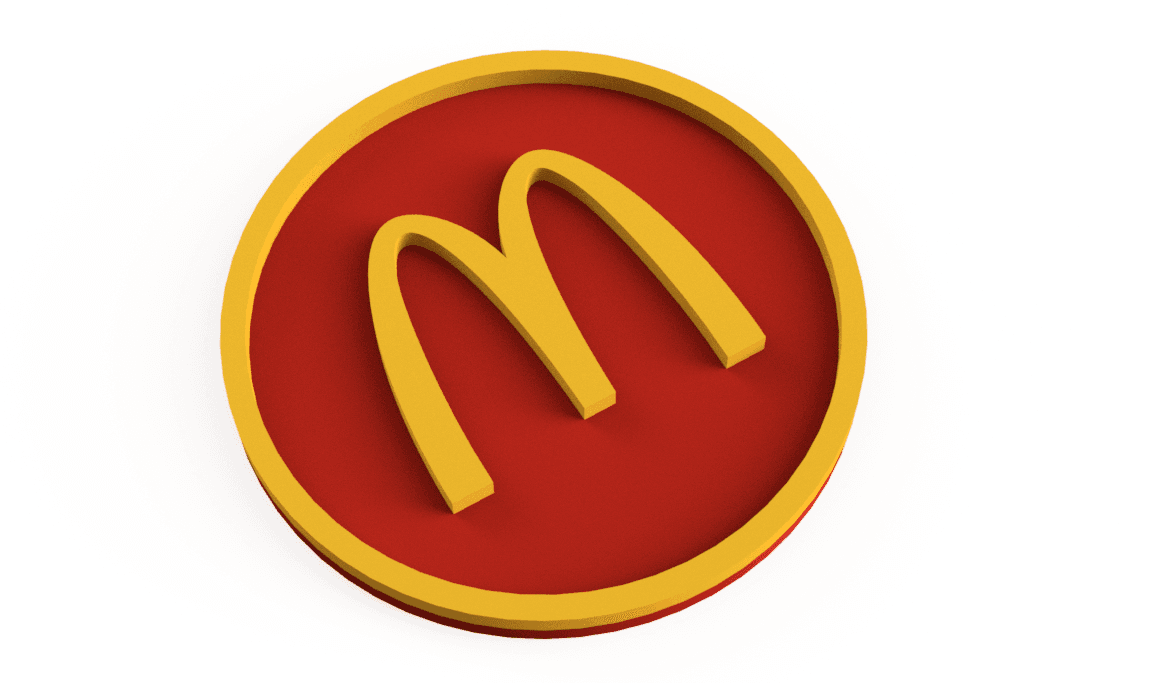 Ficha circular roja y dorada con el logotipo de McDonald’s en relieve